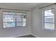 Bright bedroom with waterfront views from the windows at 1011 Spindle Palm Way, Apollo Beach, FL 33572