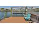 A private boat dock with a boat lift provides easy access to the water at 1011 Spindle Palm Way, Apollo Beach, FL 33572