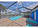 A delightful screened in pool and waterfront area featuring lots of space for entertaining at 1011 Spindle Palm Way, Apollo Beach, FL 33572