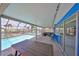 A delightful screened in pool and waterfront area featuring lots of space for entertaining at 1011 Spindle Palm Way, Apollo Beach, FL 33572