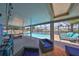 A delightful screened in pool and waterfront area featuring lots of space for entertaining at 1011 Spindle Palm Way, Apollo Beach, FL 33572