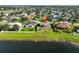 Lovely home situated on a well-manicured lot with a serene lake backdrop in a quiet neighborhood at 10540 Carloway Hills Dr, Wimauma, FL 33598