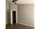 Bedroom with a ceiling fan and open closet door at 10540 Carloway Hills Dr, Wimauma, FL 33598
