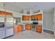 Well-equipped kitchen featuring modern appliances and ample cabinet space at 10540 Carloway Hills Dr, Wimauma, FL 33598