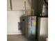 View of the home's hot water heater at 10540 Carloway Hills Dr, Wimauma, FL 33598