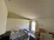 Bedroom featuring a daybed, white door, and natural light from window at 11185 Heathrow Ave, Spring Hill, FL 34609