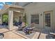 Back patio area perfect for relaxing with outdoor seating and a covered lanai at 11519 Cypress Reserve Dr, Tampa, FL 33626
