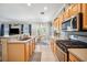 Eat-in kitchen area with stainless appliances and breakfast bar, and adjacent breakfast nook at 11519 Cypress Reserve Dr, Tampa, FL 33626