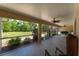 Spacious screened-in patio with backyard views offers plenty of space at 12408 Wexford Hills Rd, Riverview, FL 33569