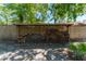 Exterior view of the wood storage area with a fence in the backyard at 12408 Wexford Hills Rd, Riverview, FL 33569
