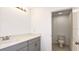 Bathroom with sink and door to toilet at 12414 Gust Ct, Hudson, FL 34669