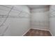 Walk-in closet featuring wire shelving and carpet flooring at 13034 Wellspring Dr, Lithia, FL 33547
