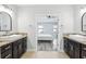 Shared bathroom with dual vessel sinks and an ensuite bedroom at 14227 Alistar Manor Dr, Wimauma, FL 33598