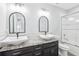 Bathroom featuring double sinks, granite counters, and a shower-tub combination at 14227 Alistar Manor Dr, Wimauma, FL 33598