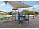 Community playground with fun slide and climbing equipment for hours of enjoyment at 14227 Alistar Manor Dr, Wimauma, FL 33598