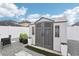 Well maintained shed provides practical storage space with a clean design, set in landscaped backyard area at 14227 Alistar Manor Dr, Wimauma, FL 33598