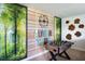 Fun game room features custom wall decor and a foosball table, ideal for entertaining at 14423 Meadow Bird Ave, Riverview, FL 33579
