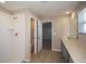 Bathroom featuring a walk-in shower, and a vanity with quartz countertops at 14811 Summer Branch Dr, Lithia, FL 33547