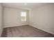 Bright bedroom with a window offering pleasant views at 14811 Summer Branch Dr, Lithia, FL 33547