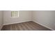 Comfortable bedroom space featuring carpet flooring and a window for natural light at 14811 Summer Branch Dr, Lithia, FL 33547