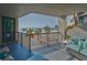 Enjoy breathtaking ocean views from this cozy balcony with comfortable seating and serene palm trees at 1600 Gulf Blvd # 212, Clearwater Beach, FL 33767