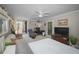 Bedroom featuring outdoor patio access with a desk and comfy seating at 1600 Gulf Blvd # 212, Clearwater Beach, FL 33767