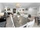 Spacious living room featuring an open layout with a fireplace, hardwood floors, and stylish decor at 1600 Gulf Blvd # 212, Clearwater Beach, FL 33767