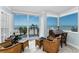 Cozy sitting room with ocean views, comfortable seating, and natural light at 1600 Gulf Blvd # 212, Clearwater Beach, FL 33767