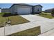 A charming single-Gathering home featuring a well-maintained lawn and a two-car garage at 209 Lazy Shore Dr, Nokomis, FL 34275