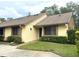 Charming exterior view of a well-maintained home with a cozy front yard and welcoming entrance at 2513 Oakleaf Ln # 26C, Clearwater, FL 33763