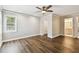This bedroom offers modern floors, neutral paint and convenient access to the bathroom at 2650 Countryside Blvd # B-110, Clearwater, FL 33761