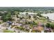 An aerial view featuring the property in a neighborhood setting close to a lake and community park at 2906 Beagle Pl, Seffner, FL 33584