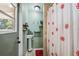 The bathroom has a clean pedestal sink and classic tile at 2906 Beagle Pl, Seffner, FL 33584