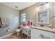 Bright bathroom with granite counters, vanity, tile floor, and great natural light at 2906 Beagle Pl, Seffner, FL 33584