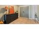 Welcoming home entrance featuring tile flooring, a storage cabinet and modern double doors at 2906 Beagle Pl, Seffner, FL 33584