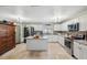Bright kitchen featuring stainless steel appliances, white cabinets, and a center island at 2906 Beagle Pl, Seffner, FL 33584