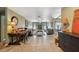 Bright, open-concept living room featuring tile floors, comfortable seating, fireplace, and lots of natural light at 2906 Beagle Pl, Seffner, FL 33584