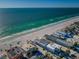 Stunning aerial view of the beach, condo complex, and ocean at 3 7Th Ave # 3, Indian Rocks Beach, FL 33785
