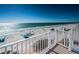 Balcony with ocean views showing people enjoying the beach at 3 7Th Ave # 3, Indian Rocks Beach, FL 33785