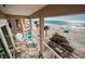 Cozy balcony with seating and stunning views of the beach and ocean at 3 7Th Ave # 3, Indian Rocks Beach, FL 33785