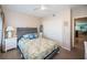 Bright bedroom featuring a ceiling fan, closet space, and an inviting bed at 3 7Th Ave # 3, Indian Rocks Beach, FL 33785