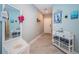 Inviting entryway with coastal decor, seating, and ample storage at 3 7Th Ave # 3, Indian Rocks Beach, FL 33785
