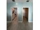 Hallway showing primary bath and closet at 3 7Th Ave # 3, Indian Rocks Beach, FL 33785