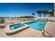 Outdoor pool and spa area with a white fence and views of the ocean and beach at 3 7Th Ave # 3, Indian Rocks Beach, FL 33785