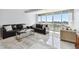 Bright living room with marble floors and expansive windows offering a scenic view at 31 Island Way # 609, Clearwater Beach, FL 33767