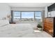 Bright main bedroom showcasing waterfront views and a comfortable, inviting layout at 31 Island Way # 609, Clearwater Beach, FL 33767