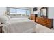 Bright main bedroom showcasing waterfront views and a comfortable, inviting layout at 31 Island Way # 609, Clearwater Beach, FL 33767