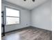 This bedroom has hard floors and large window for lots of light at 3604 Brigadoon Cir # 3604, Clearwater, FL 33759