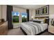 Cozy bedroom with large windows offering serene views, complemented by stylish decor and comfortable furnishings at 37061 Sagemoor Dr, Zephyrhills, FL 33541