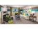 Bright and modern living room with comfortable seating, stylish decor, and plenty of natural light at 37061 Sagemoor Dr, Zephyrhills, FL 33541